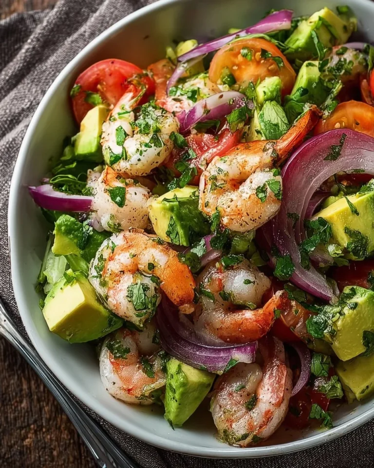 Fresh Shrimp Avocado Salad with vibrant greens and dressing