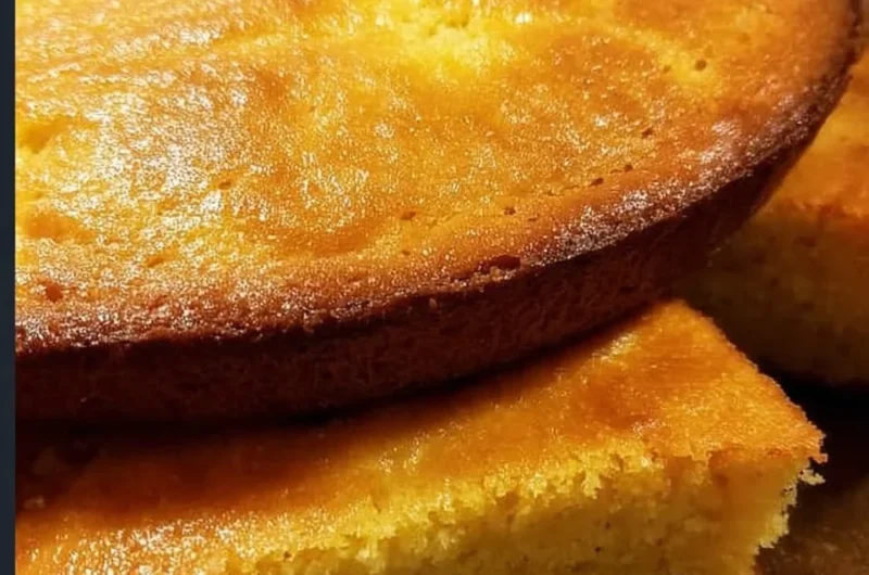 Freshly baked homemade cornbread in a cast iron skillet
