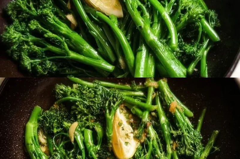 Saut&eacute;ed lemon garlic broccolini on a white plate garnished with lemon slices.
