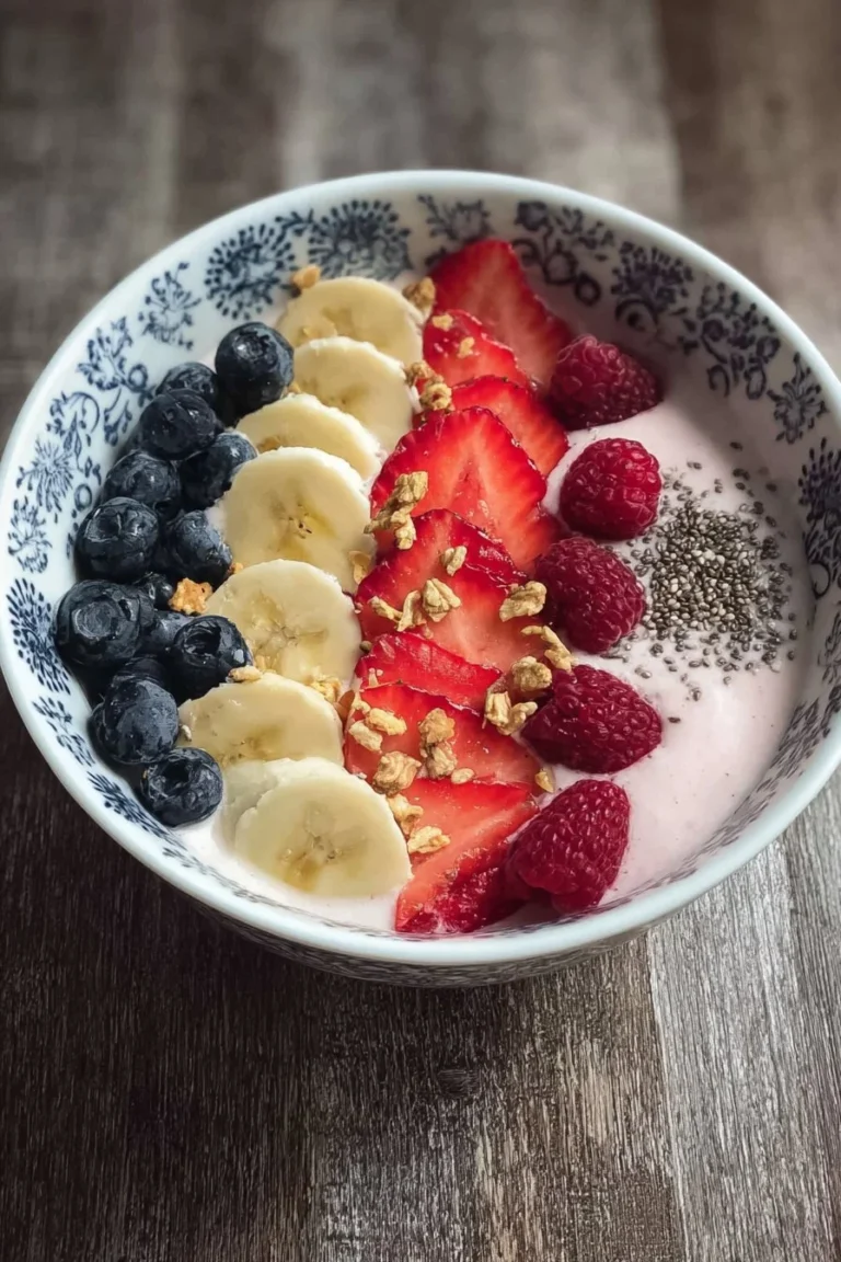 5-Minute smoothie bowl topped with yogurt and fresh fruits for a healthy meal.
