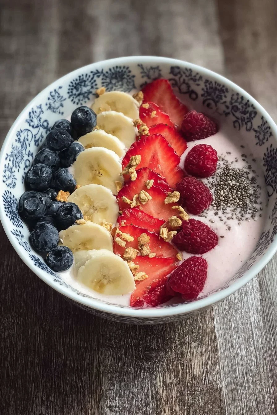 5-Minute smoothie bowl topped with yogurt and fresh fruits for a healthy meal.