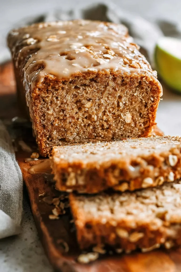 Homemade apple cinnamon oatmeal bread loaf with oats and spices