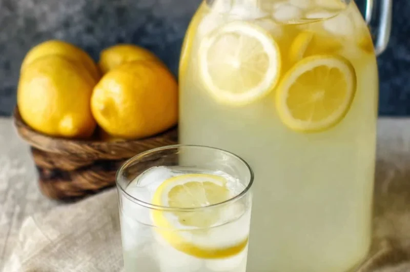 Glass of homemade lemonade made with fresh lemons