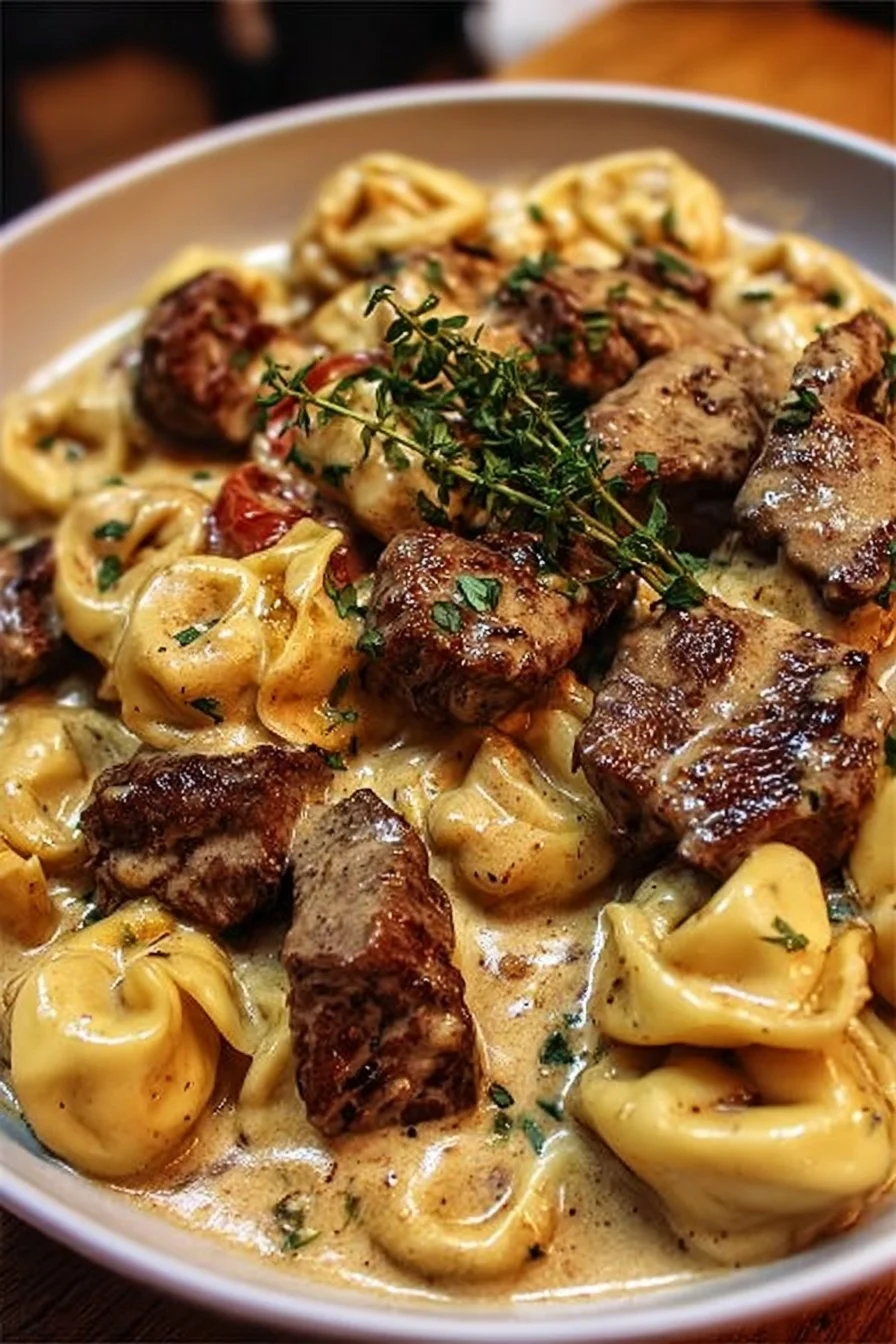Irresistible Cracked Garlic Steak Tortellini in Creamhouse Sauce