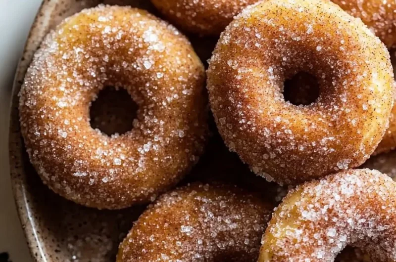 Delicious baked apple cider donuts with a cinnamon sugar topping