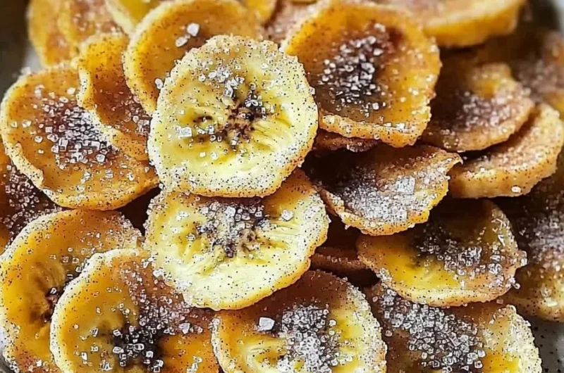 Delicious homemade cinnamon sugar banana chips on a wooden board