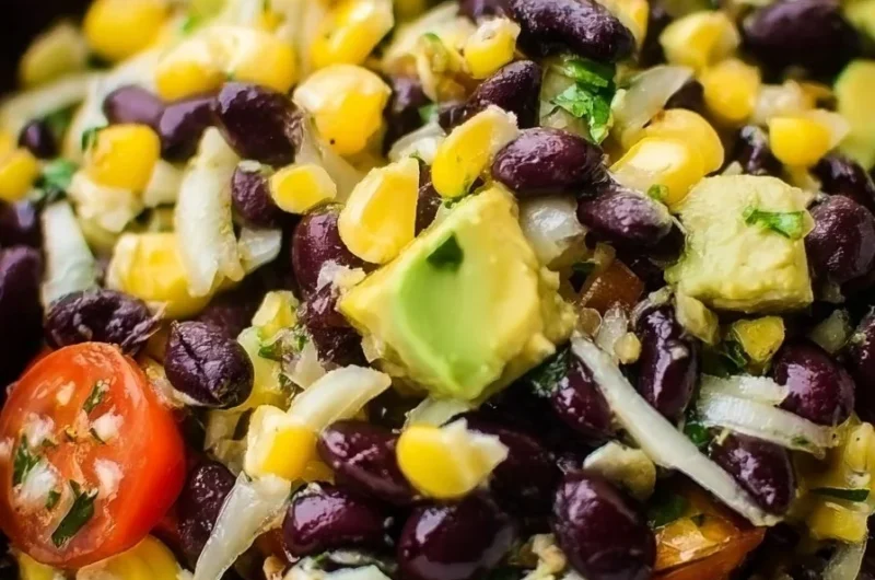 Colorful corn black bean avocado salad with fresh ingredients