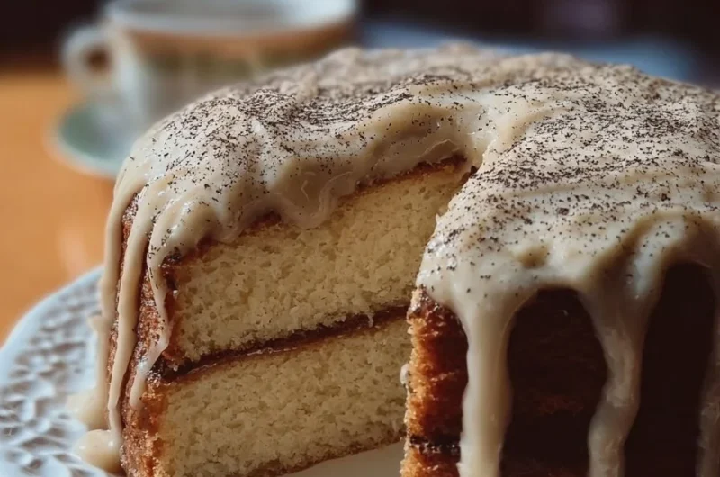 Cozy Earl Grey London Fog Cake topped with frosting and tea leaves
