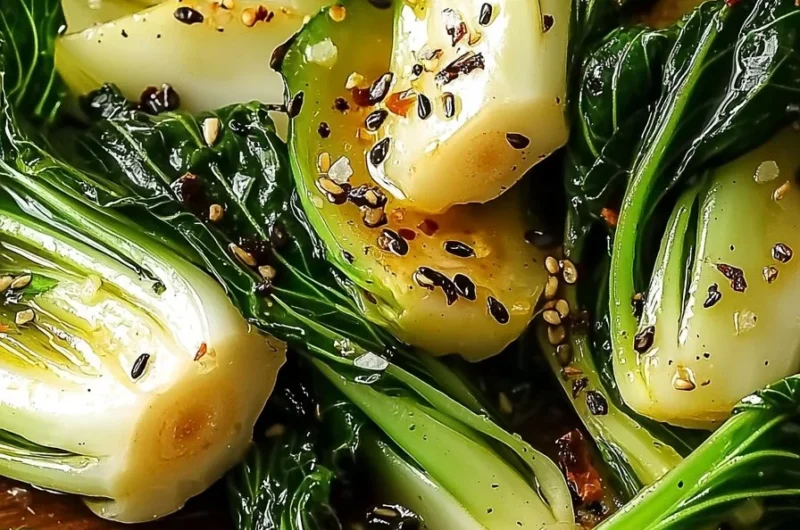 Dish of saut&eacute;ed bok choy with garlic and ginger served on a plate