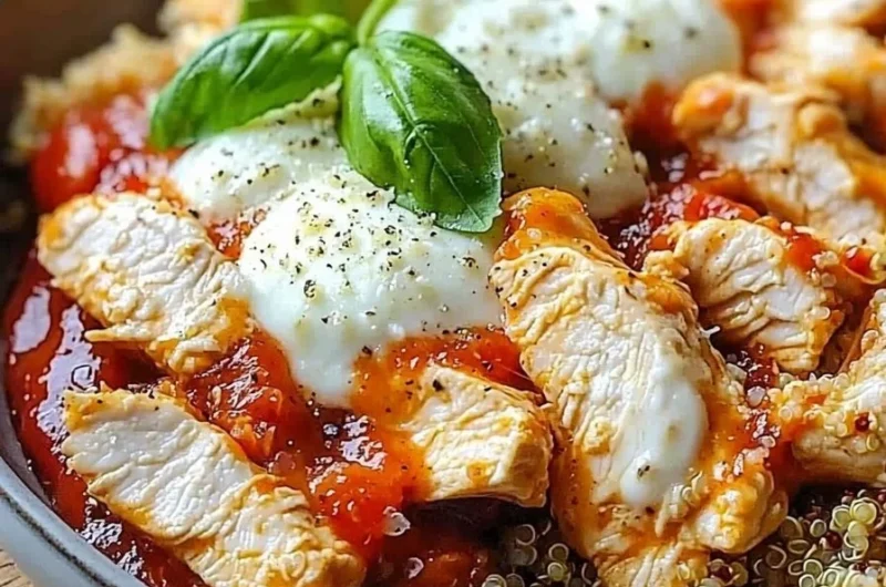 High-protein chicken parm bowl with fresh ingredients and cheese.