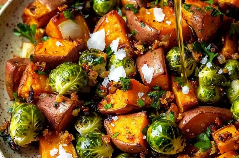 Easy Sweet Potato Brussel Sprout Hash with colorful vegetables in a skillet