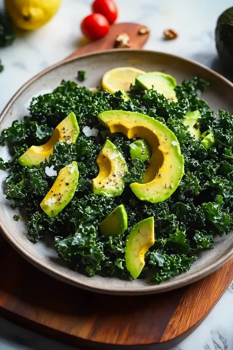 Delicious avocado lemon kale salad with fresh ingredients in a bowl