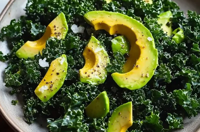 Delicious avocado lemon kale salad with fresh ingredients in a bowl