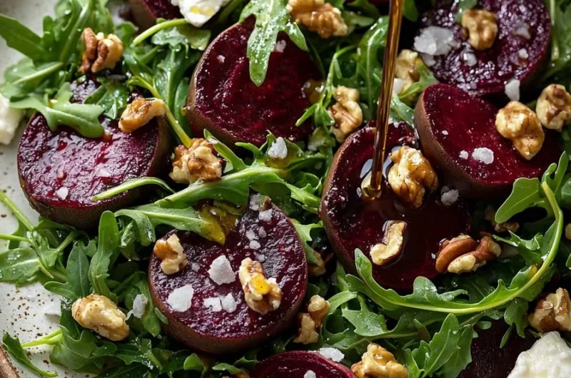 Roasted beet and arugula salad with feta cheese and walnuts