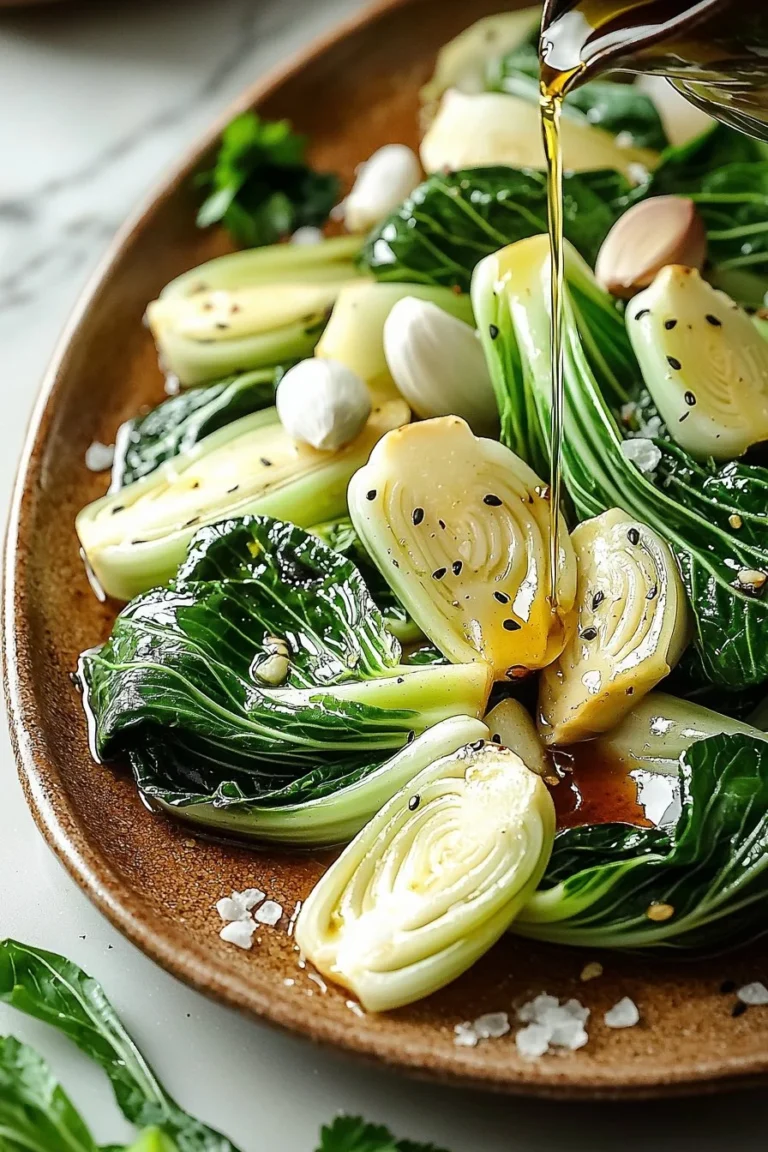 Sautéed bok choy with garlic and ginger served in a bowl