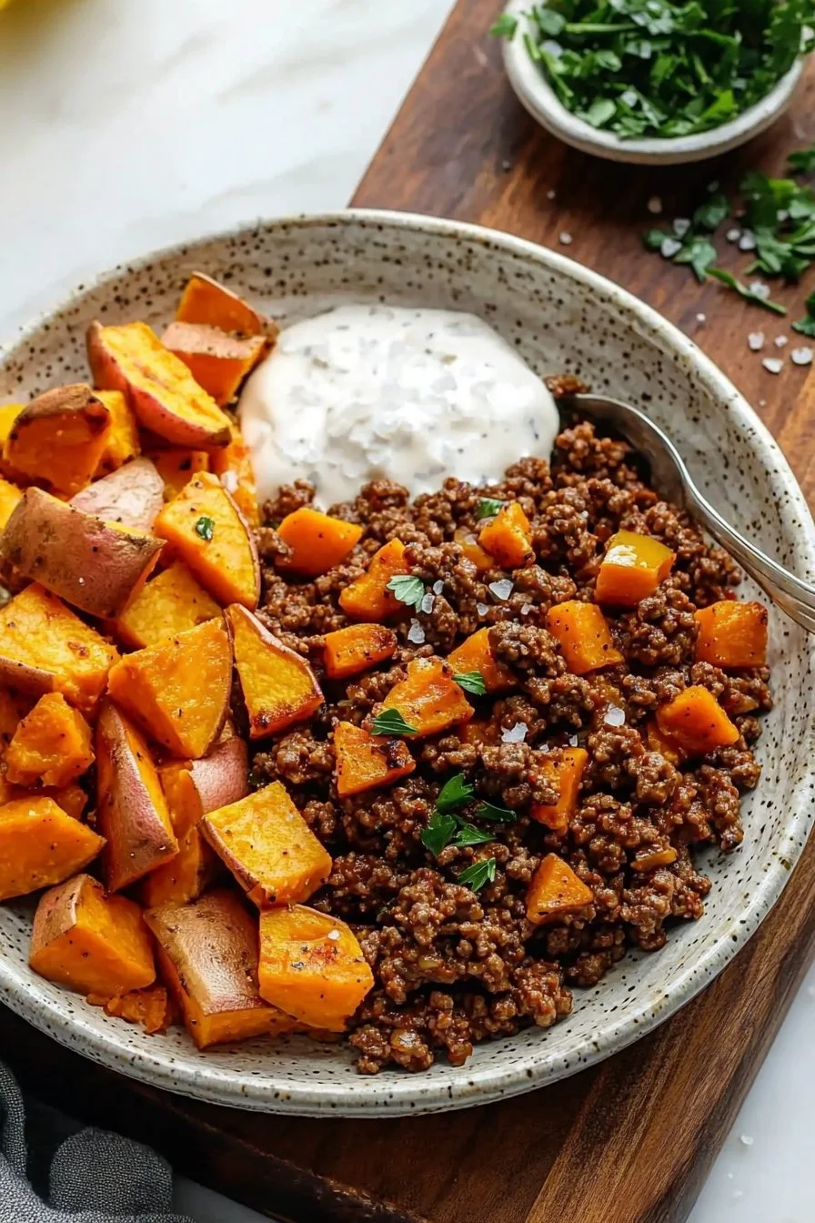 Viral Ground Beef Sweet Potato Bowl served with colorful vegetables